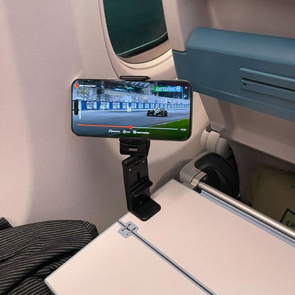 Lighteme Folding mobile phone holder - No more holding your phone while traveling